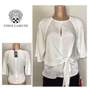 New. Vince Camuto ivory blouse bar top. Retails $89. Size XS. runs a little big.